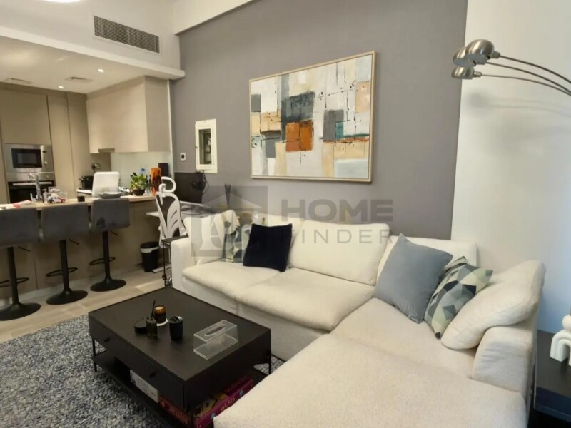 Apartment for Sale in Oxford Residence 2 - Jumeirah Village Circle, Dubai - Pool View | Sunny One-Bedroom | Fully Equipped at 1090000 AED