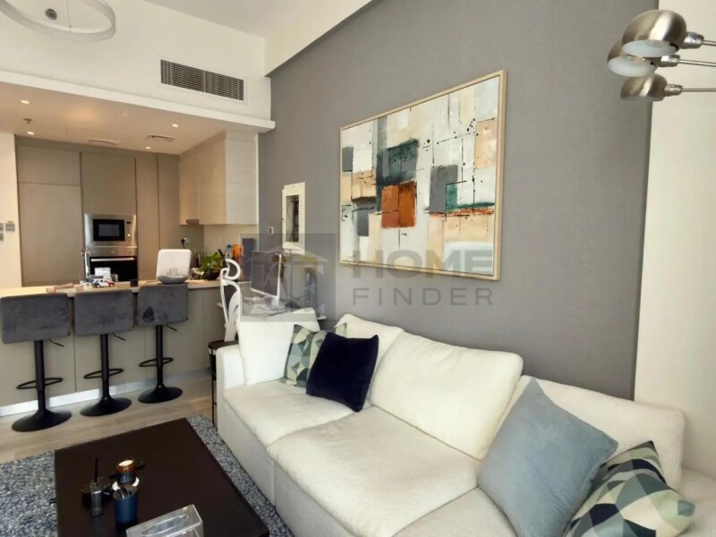 Apartment for Sale in Oxford Residence 2 - Jumeirah Village Circle, Dubai - Pool View | Sunny One-Bedroom | Fully Equipped at 1090000 AED