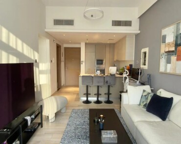 Apartment for Sale in Oxford Residence 2 - Jumeirah Village Circle, Dubai - Pool View | Sunny One-Bedroom | Fully Equipped at 1090000 AED