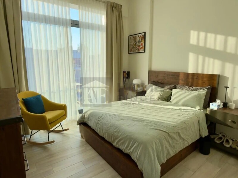 Apartment for Sale in Oxford Residence 2 - Jumeirah Village Circle, Dubai - Pool View | Sunny One-Bedroom | Fully Equipped at 1090000 AED