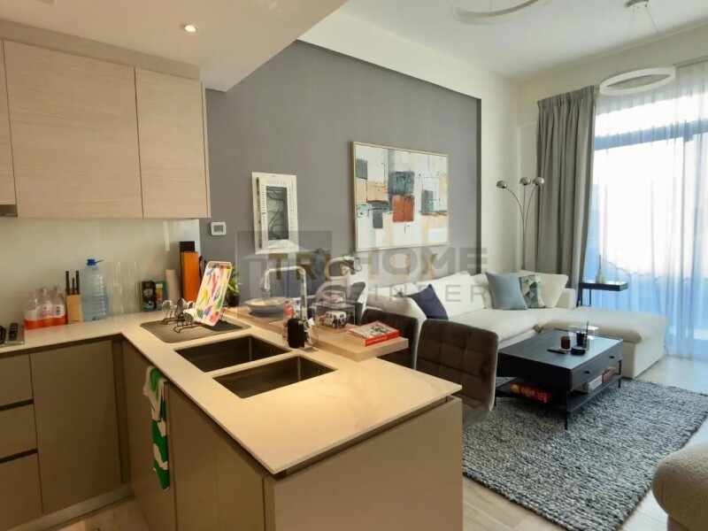 Apartment for Sale in Oxford Residence 2 - Jumeirah Village Circle, Dubai - Pool View | Sunny One-Bedroom | Fully Equipped at 1090000 AED