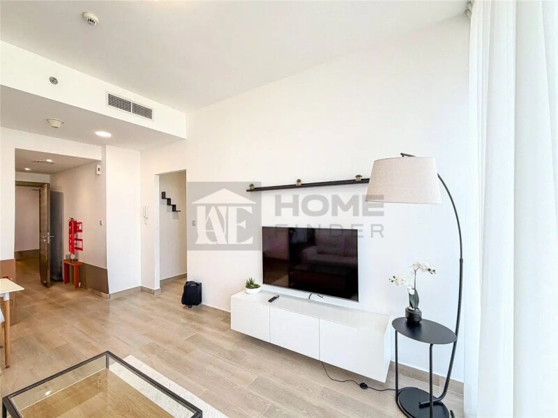 Apartment for Rent in Bloom Tower B - Jumeirah Village Circle, Dubai - Fully Furnished | 12 cheques | Balcony | Pool View at 85000 AED
