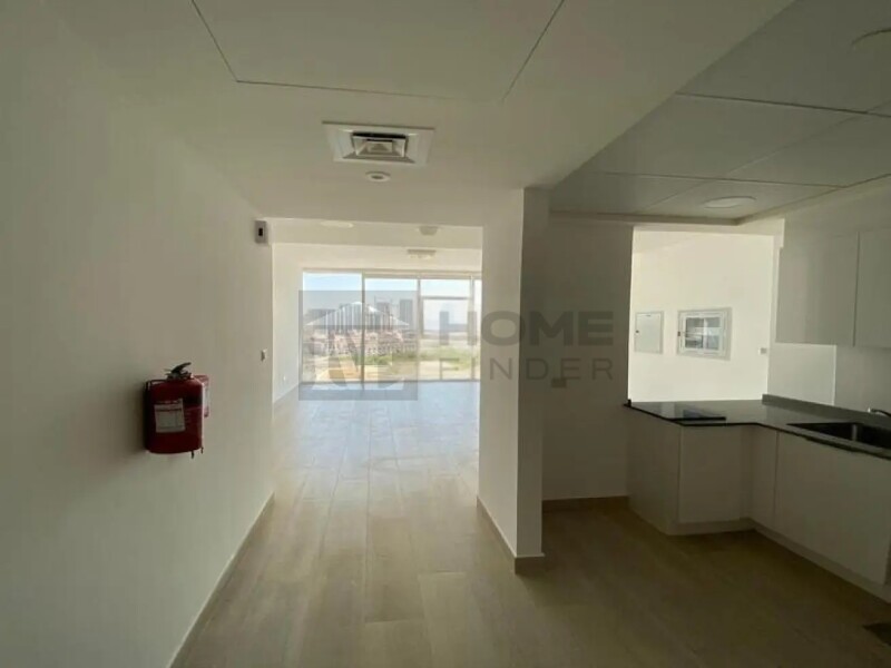 Apartment for Rent in Bloom Tower B - Jumeirah Village Circle, Dubai - Unfurnished |Prime Location |Community View at 74999 AED