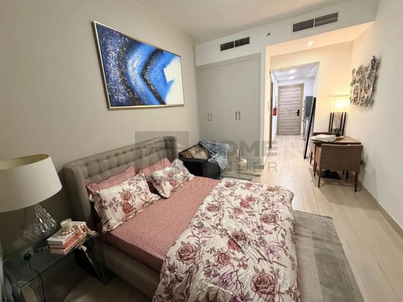 Apartment for Rent in Bloom Tower C - Jumeirah Village Circle, Dubai - Large Furnished Studio I Prime Location & Premium at 59000 AED
