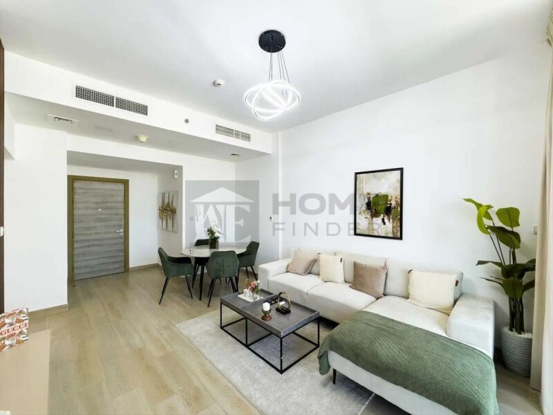 Apartment for Rent in Bloom Tower A - Jumeirah Village Circle, Dubai - Fully Furnished | Near Exit | Huge Corner Balcony at 69000 AED