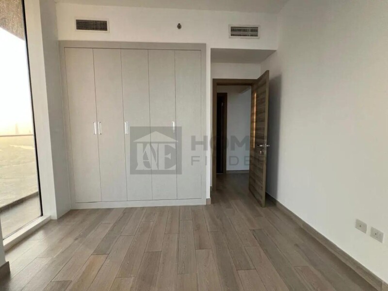 Apartment for Rent in Bloom Tower A - Jumeirah Village Circle, Dubai - Community View | Unfurnished 1BR| Ready to Move at 84999 AED