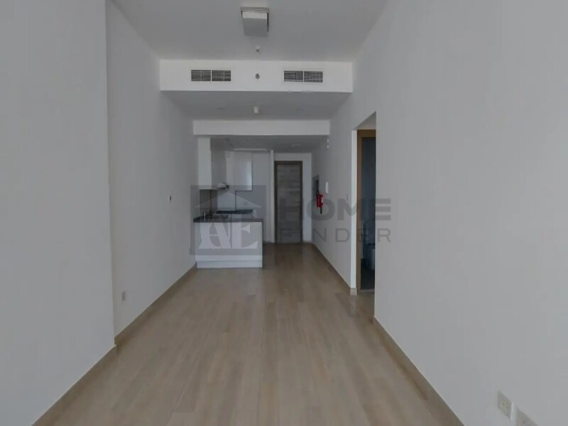 Apartment for Rent in Bloom Tower A - Jumeirah Village Circle, Dubai - Unfurnished 2BR | Prime location | Ready to move at 134999 AED