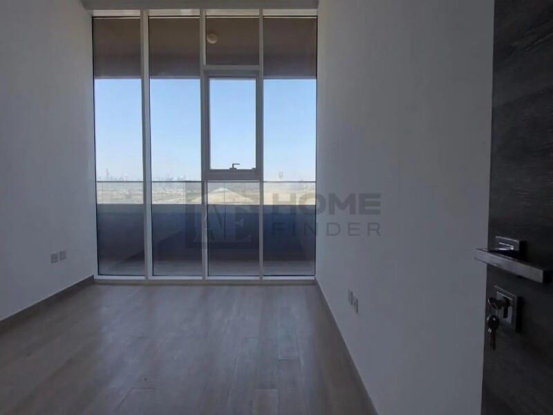 Apartment for Rent in Bloom Tower A - Jumeirah Village Circle, Dubai - Unfurnished 2BR | Prime location | Ready to move at 134999 AED