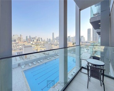 Apartment for Rent in Bloom Tower C - Jumeirah Village Circle, Dubai - Fully furnished |12 Cheques | Pool View at 81000 AED